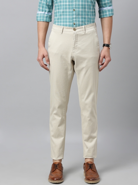 

Van Heusen Sport Men Cream-Coloured Tapered Fit Solid Regular Trousers
