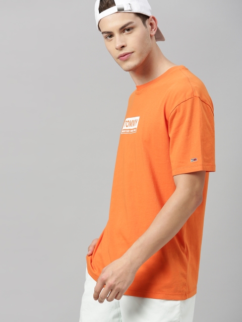 

Tommy Hilfiger Men Orange Printed Round Neck Pure Cotton T-shirt