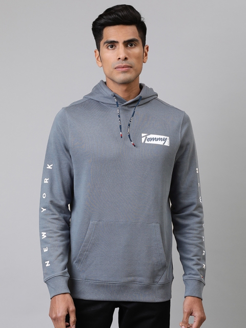

Tommy Hilfiger Men Blue Solid Hooded Sweatshirt With Printed Detailing