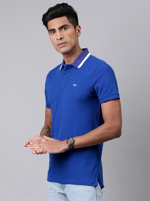 

Tommy Hilfiger Men Blue Solid Polo Collar T-shirt