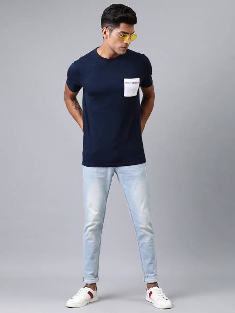 

Tommy Hilfiger Men Navy Blue Solid Round Neck T-shirt with Contrast Pocket