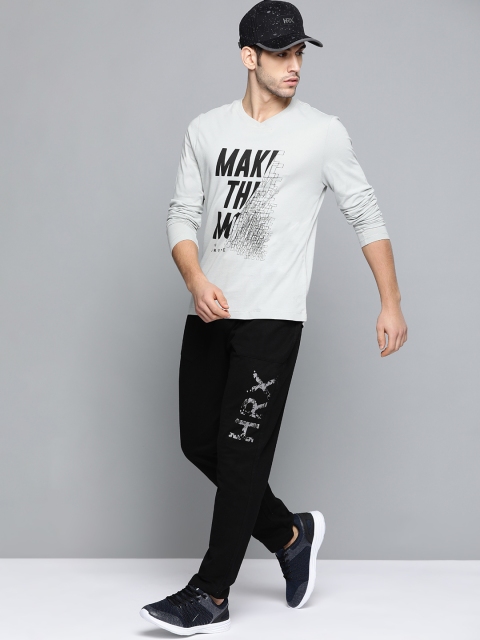

HRX by Hrithik Roshan Men Jet Black Solid Regular Fit Bio-Wash Lifestyle Track Pants