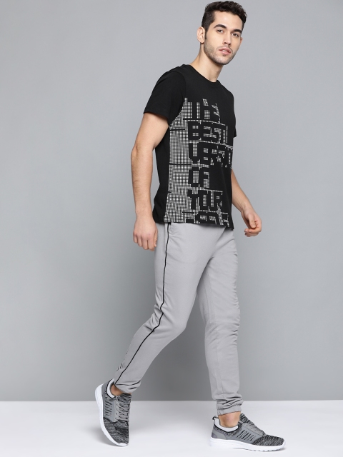 

HRX by Hrithik Roshan Men Grey Solid Regular Fit Bio-Wash Lifestyle Joggers