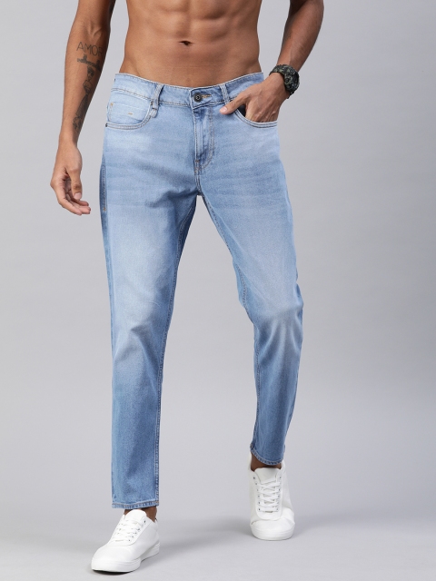 

Roadster Men Blue Tapered Slim Ankle Fit Mid-Rise Clean Look Stretchable Jeans