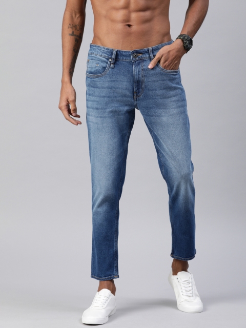 

Roadster Men Blue Slim Tapered Fit Mid-Rise Clean Look Stretchable Cropped Jeans