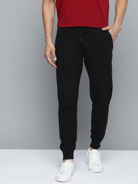 

Mast & Harbour Men Black Solid Joggers