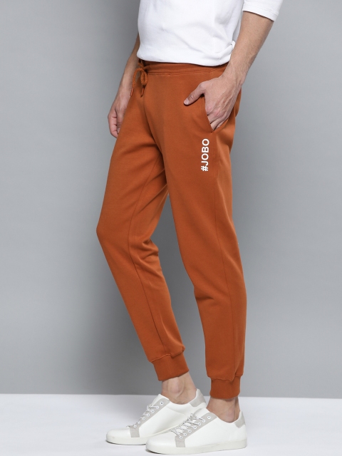 

Mast & Harbour Men Rust Orange Solid Joggers