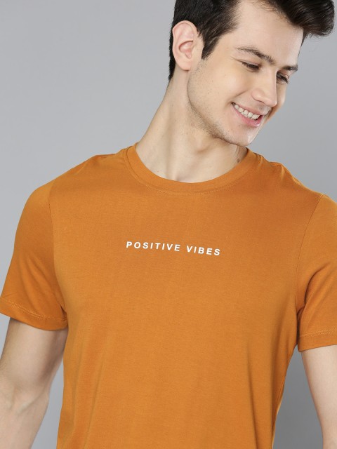 

Mast & Harbour Men Mustard Brown Solid Round Neck T-shirt