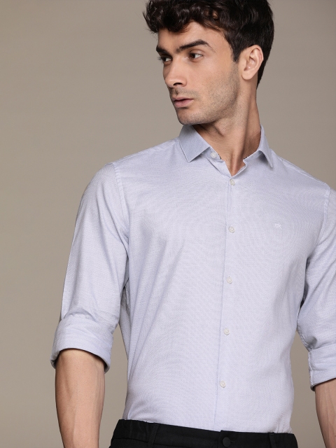 

Calvin Klein Jeans Men Blue Slim Fit Self Designed Semiformal Shirt