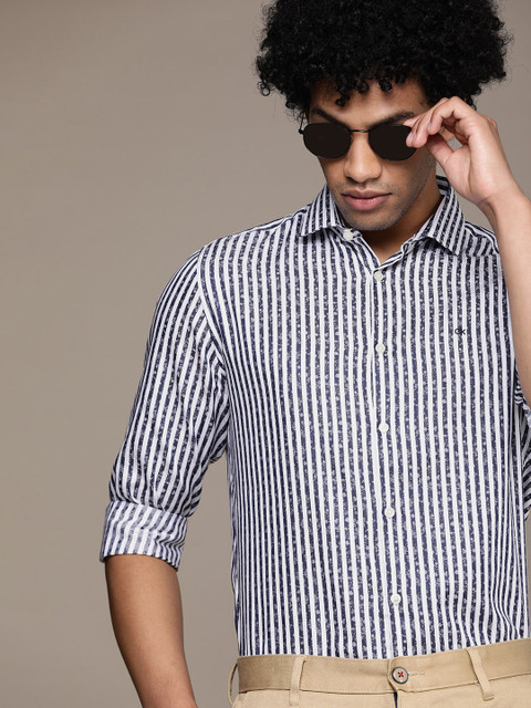 

Calvin Klein Jeans Men Navy Blue & White Slim Fit Striped Semiformal Shirt