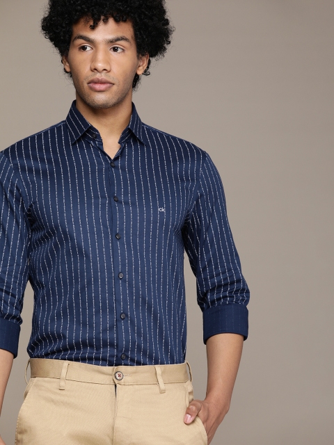 

Calvin Klein Jeans Men Navy Blue & White Slim Fit Striped Semiformal Shirt