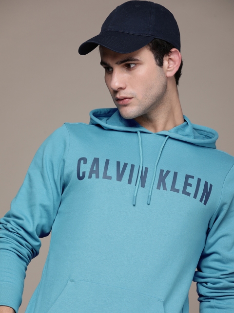 

Calvin Klein Jeans Men Blue Typographical Printed Hooded Sweatshirt