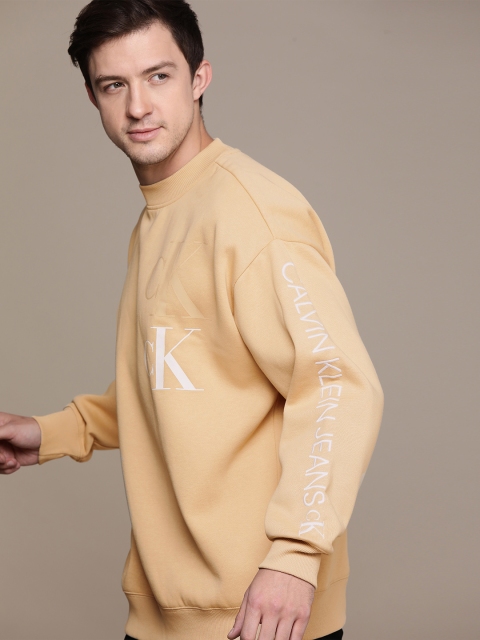 

Calvin Klein Jeans Men Beige & White Printed Sweatshirt
