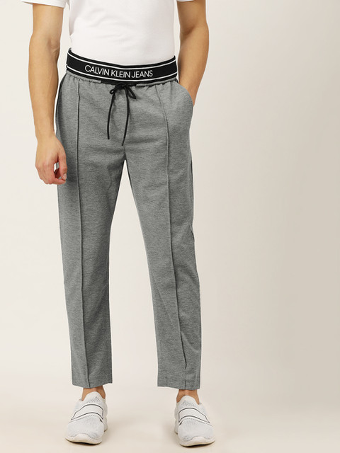 

Calvin Klein Jeans Men Grey Melange Slim Fit Solid Pleated Track Pants
