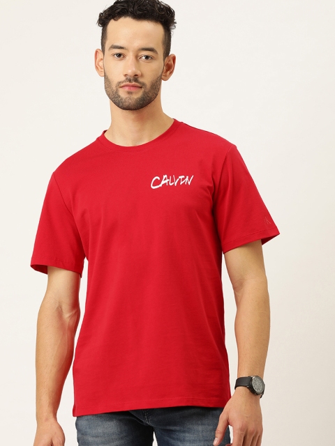

Calvin Klein Jeans Men Red Solid Round Neck Pure Cotton T-shirt with Print