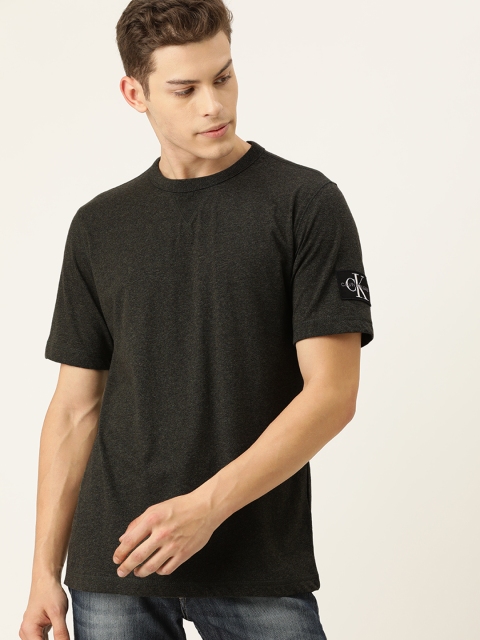 

Calvin Klein Jeans Men Olive Green Solid Round Neck T-shirt