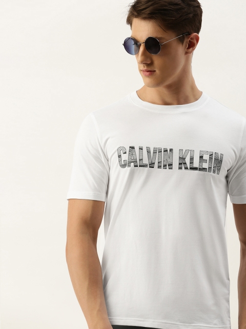 

Calvin Klein Jeans Men White Solid Round Neck T-shirt