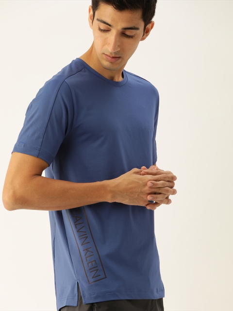 

Calvin Klein Jeans Men Blue Solid Round Neck Training T-shirt with Print