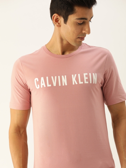 

Calvin Klein Jeans Men Pink Solid Round Neck T-shirt
