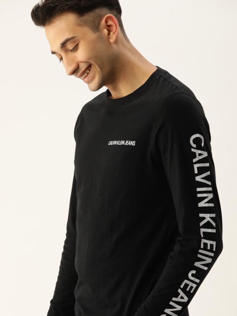 

Calvin Klein Jeans Men Black Solid Organic Cotton Round Neck T-shirt With Printed Sleeves