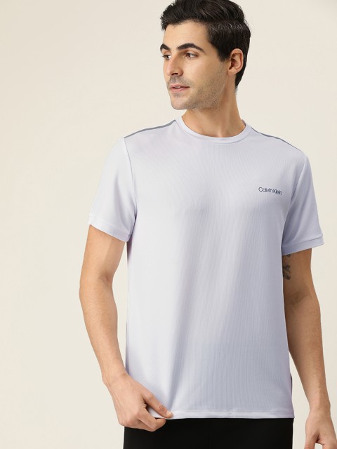 

Calvin Klein Jeans Men White Solid Round Neck T-shirt