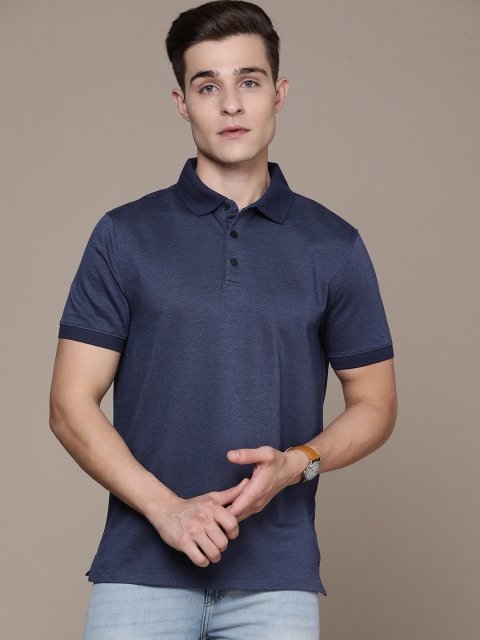 

Calvin Klein Jeans Men Blue Polo Collar Pure Cotton T-shirt