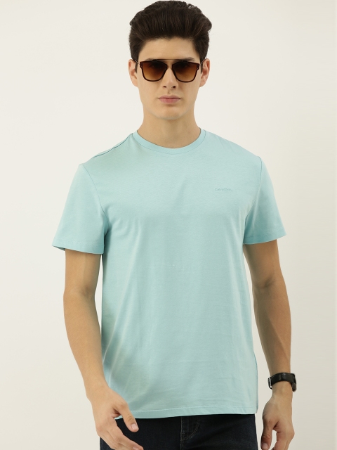 

Calvin Klein Jeans Men Blue Solid Round Neck T-shirt