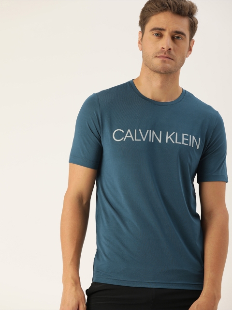 

Calvin Klein Jeans Men Teal Blue Printed Round Neck T-shirt