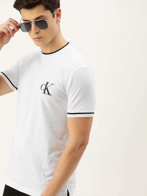 

Calvin Klein Jeans Men White Solid Round Neck T-shirt with Printed Detail