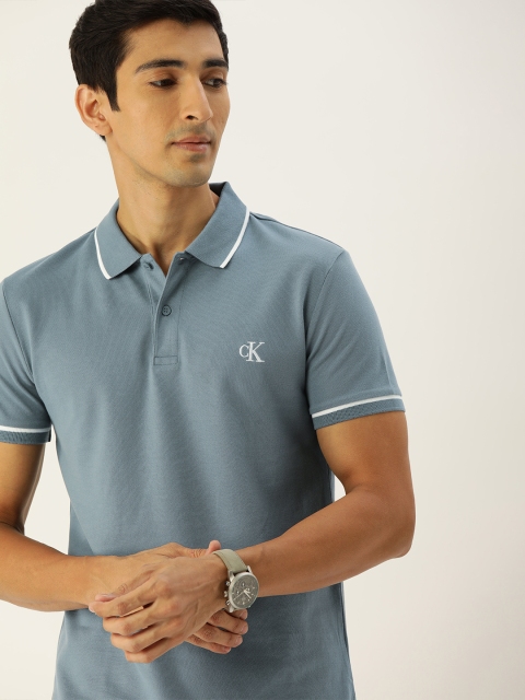 

Calvin Klein Jeans Men Blue Solid Polo Collar T-shirt
