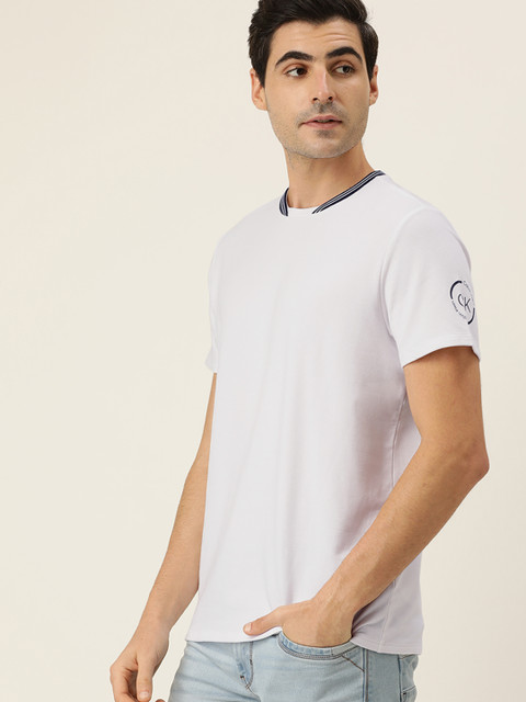 

Calvin Klein Jeans Men White Solid Round Neck T-shirt with Print Detail