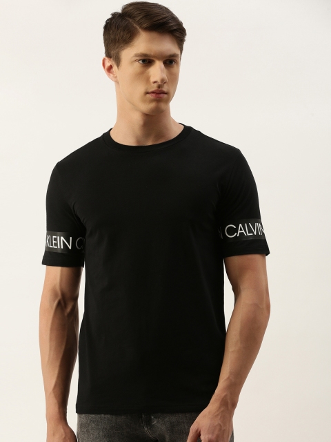 

Calvin Klein Jeans Men Black Solid Round Neck T-shirt