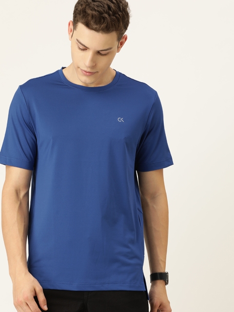 

Calvin Klein Jeans Men Blue Solid Round Neck T-shirt