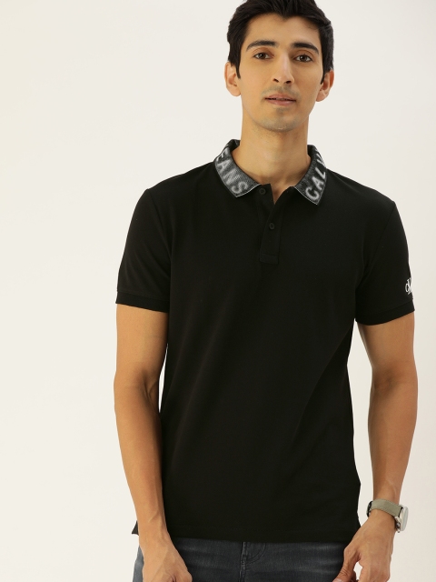 

Calvin Klein Jeans Men Black Solid Round Neck T-shirt