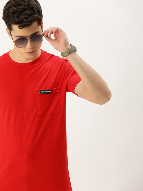 

Calvin Klein Jeans Men Red Solid Round Neck T-shirt with Pocket