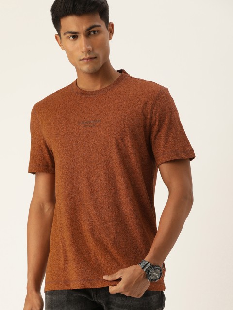 

Calvin Klein Jeans Men Orange Solid Round Neck T-shirt