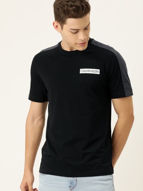 

Calvin Klein Jeans Men Black Solid Round Neck T-shirt With Printed Detailing