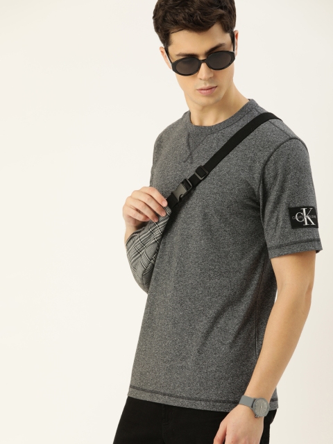 

Calvin Klein Jeans Men Charcoal Grey Solid Round Neck T-shirt