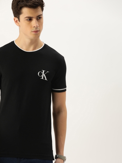 

Calvin Klein Jeans Men Black Solid Round Neck T-shirt with Printed Detail