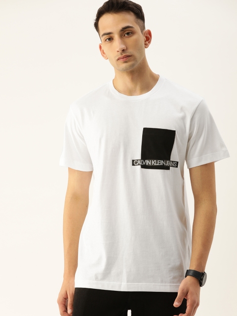 

Calvin Klein Jeans Men White Solid Round Neck T-shirt