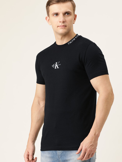 

Calvin Klein Jeans Men Black Solid Round Neck T-shirt with Printed Detail
