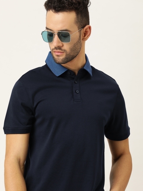 

Calvin Klein Jeans Men Navy Blue Solid Polo Collar T-shirt