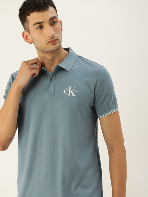 

Calvin Klein Jeans Men Blue Solid Round Neck T-shirt