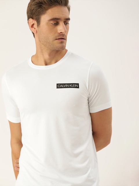 

Calvin Klein Jeans Men White Solid Round Neck T-shirt