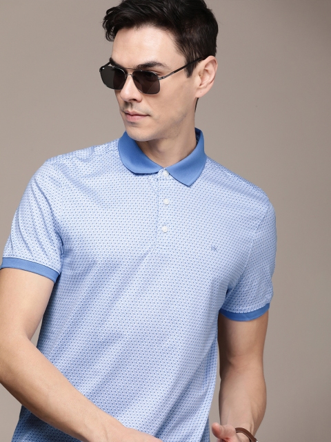 

Calvin Klein Jeans Men Blue Printed Polo Collar Pure Cotton T-shirt