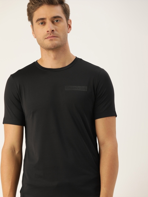 

Calvin Klein Jeans Men Black Solid Round Neck T-shirt