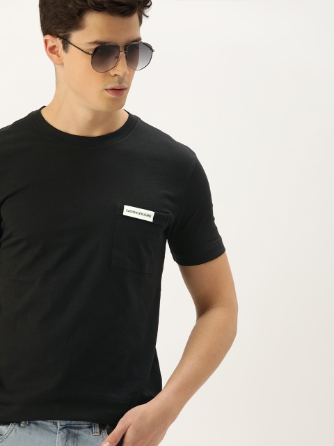 

Calvin Klein Jeans Men Black Solid Round Neck T-shirt