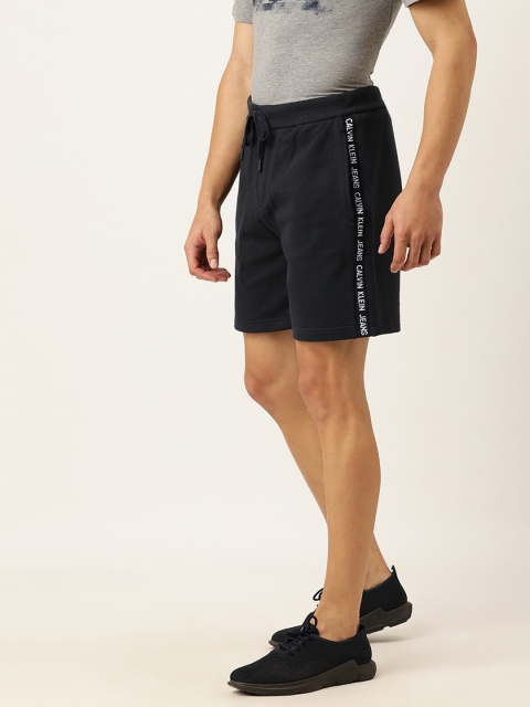 

Calvin Klein Jeans Men Black Solid Regular Fit Regular Shorts with Taping Detail