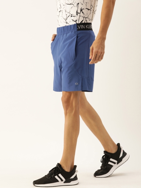 

Calvin Klein Jeans Men Blue Solid Regular Fit Regular Shorts