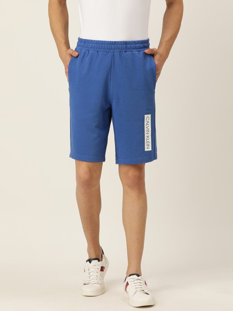 

Calvin Klein Jeans Men Blue Solid Regular Fit Regular Shorts with Printed Detail